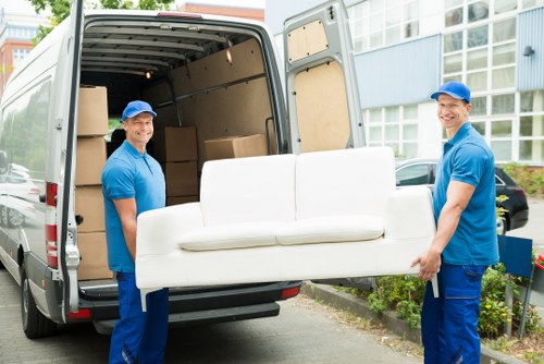 Man with van service vehicle and moving boxes