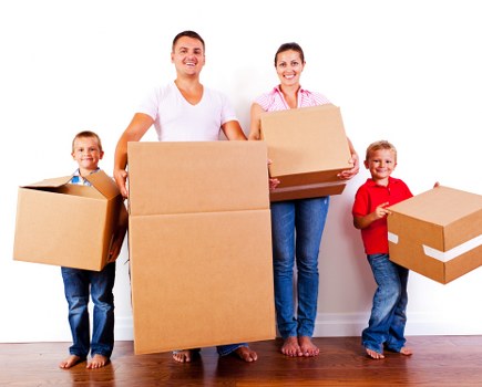 Movers loading boxes for a home move in Notting Hill