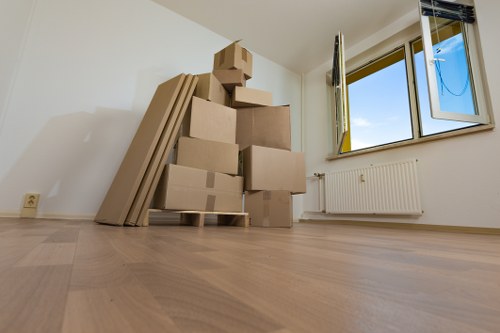 Removal team loading furniture for a local house move in Notting Hill
