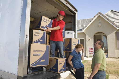Packed boxes and furniture ready for removals service