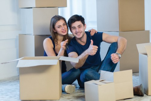 Professional movers handling boxes safely during a Notting Hill move