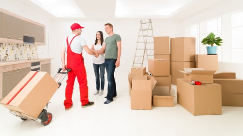 Team managing a flat move with stairs and access challenges in Notting Hill