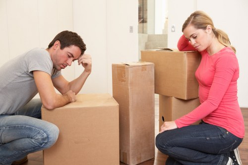Furniture and boxes being loaded into a moving van in Notting Hill