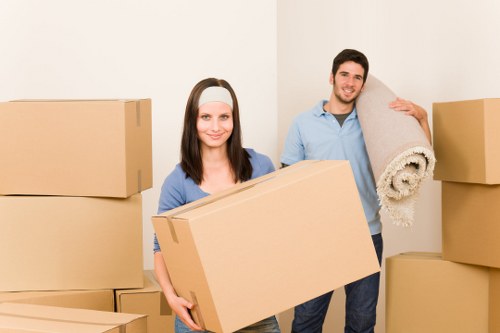 Packed office boxes and furniture ready for relocation
