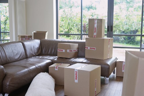 Prepared moving boxes and van for a Notting Hill relocation