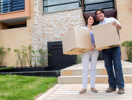 Local office moving team handling furniture in Notting Hill