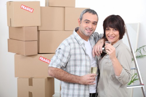 Packed office equipment ready for relocation in West London